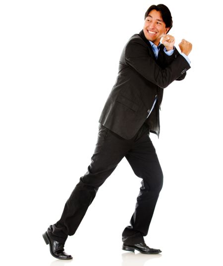 Business man pulling an imaginary rope - isolated over a white background