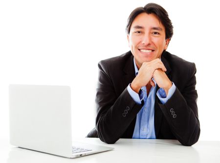 Businessman with a laptop computer - isolated over a white background