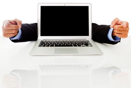 Laptop with hands pointing - isolated over a white background